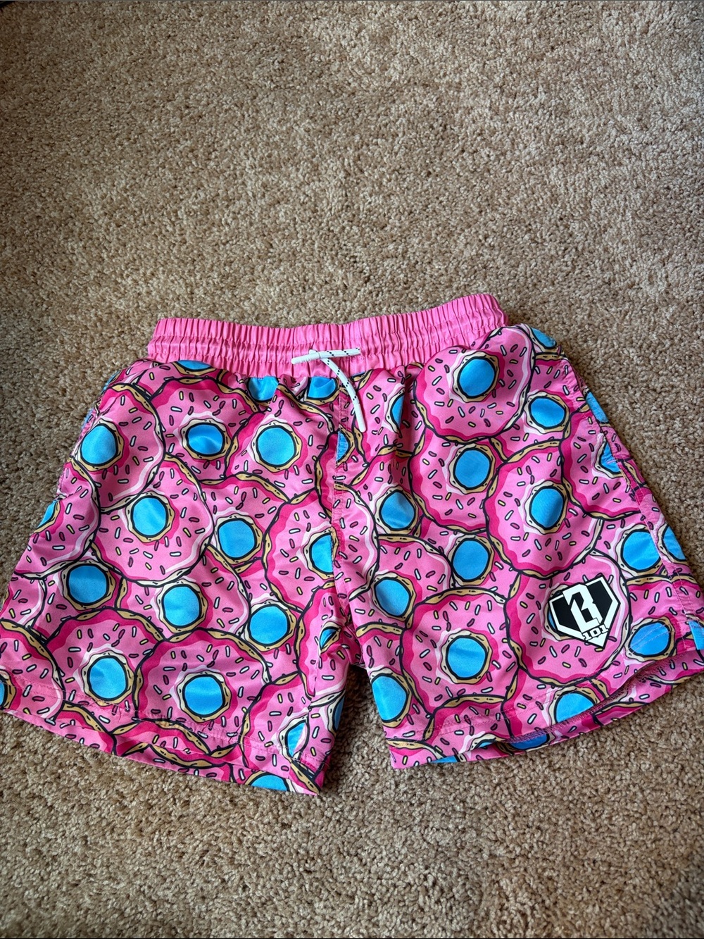 Baseball 101 Boys Pink Donut-Print Swim Trunks with Blue Accents